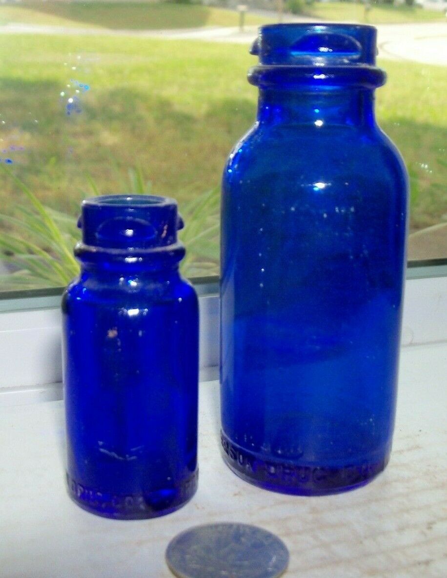2 Different Size Blue Medicine Bottles Embossed , Bromo -seltzer Emerson Drug Co